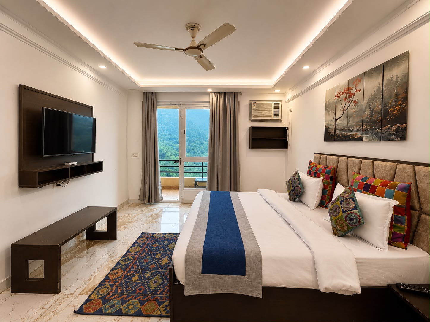 Bedroom with balcony and mountain outlook at Aloha Oasis