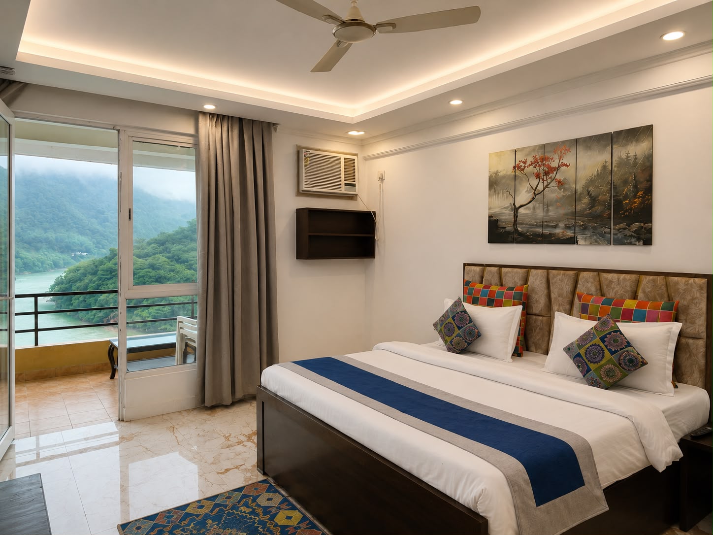 Bedroom opening onto the Ganga balcony at Aloha Oasis
