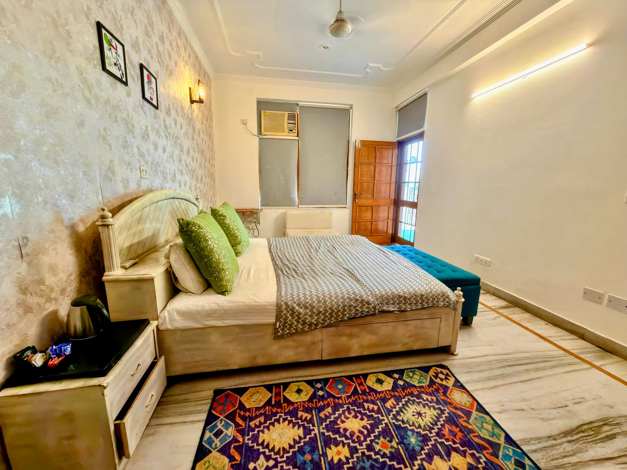 Comfortable bedroom with marble flooring