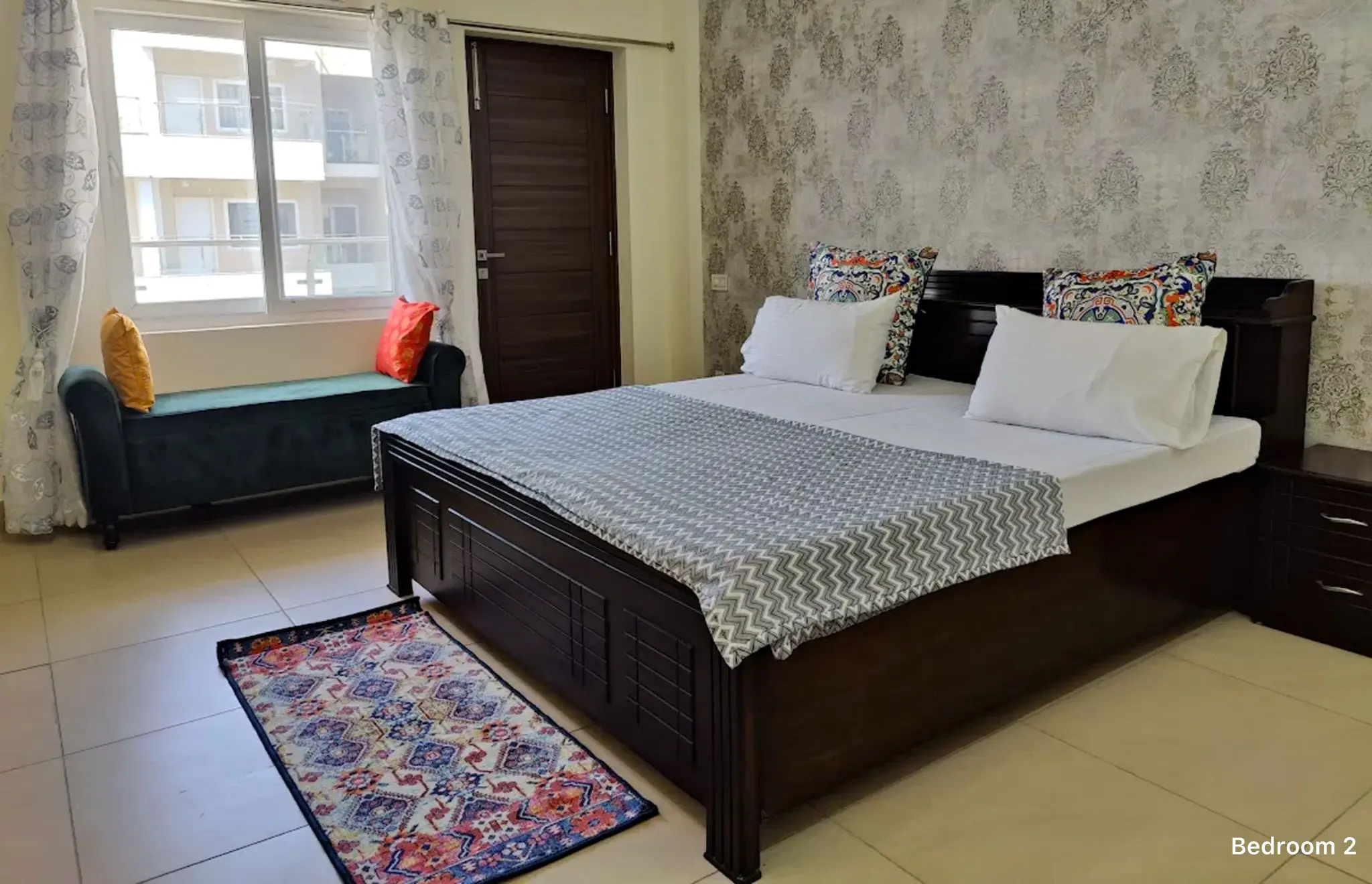 Bedroom 2 with window seat at Ganges Heaven